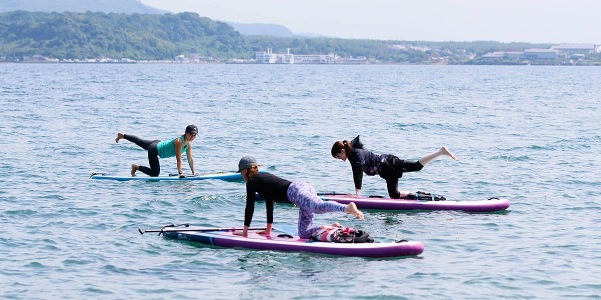 sup yoga standup paddleboarding sightseeing outdoor activity iso beach kagoshima kinko bay