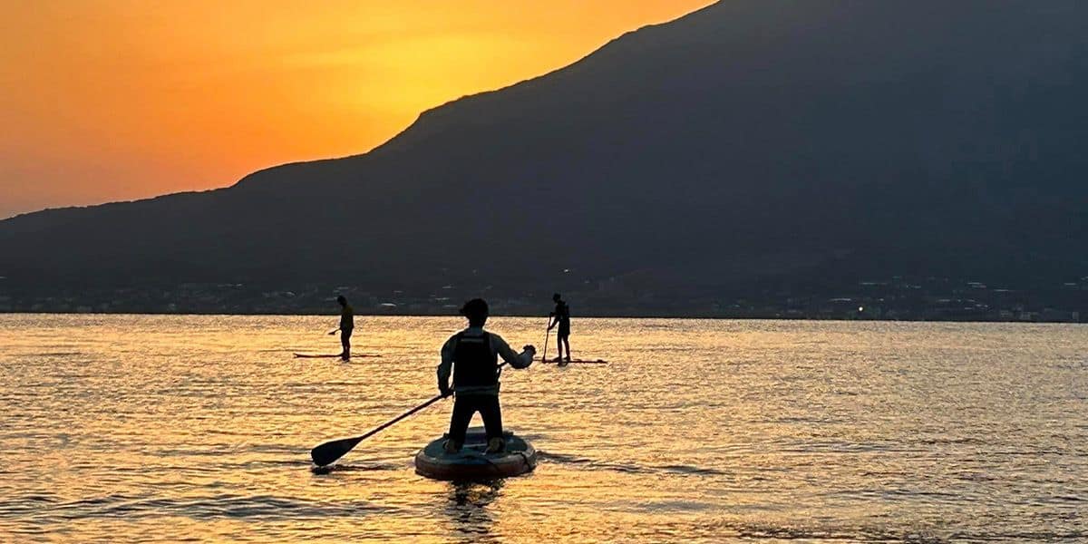 sup standup paddleboarding volcano sunrise outdoor activity kagoshima beach bay kyushu japan
